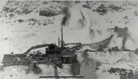 Iowa Mine structures at Silver Lake in 1898, looking toward the west, showing the operation at peak development, including tram station and surface tram trestle. Photo: San Juan County Historical Society