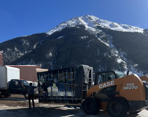 The delivery of the new grocery cases thankfully happened on a warm sunny winter day. Photo credit Darlene Watson