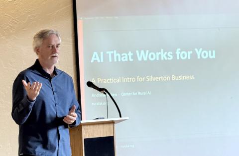 A professor from Ft Lewis gives a presentation on how to utilize AI in your small business photo by DeAnne Gallegos