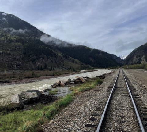 Train tracks leading to summer Photo by Scott Fetchenhier