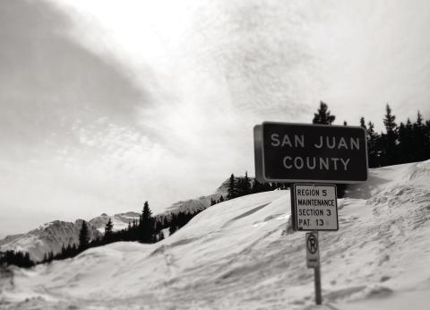 San Juan County sign on the top of Red Mountain Pass. Photo by Adam Andrade