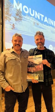 Mountainfilm on Tour Silverton emcee Rory Cowie and event organizer Brenden Goetz stand in front of a sold out crowd. Photo credit DeAnne Gallegos