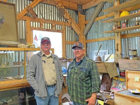 Bill Jones and Jake Gallegos Standing in front of the mining artifact display at the gift shop Photo credit Hillary Cable