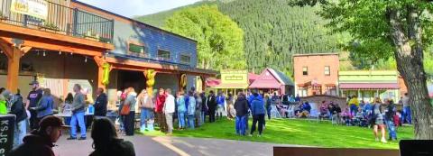 Local crowd at Anesi Park for the Town’s 150th. Photo by Jim Harper