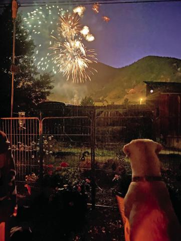 Locals enjoying the fireworks from their front porch. Photo credit Angela McCartney