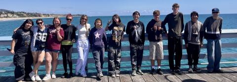 (L to R) Ixareli Angeles, Valentina Fierro, Brynn Hamm, Patience Rhoades, Renata Rosales, Sarah Lowrance, Marie Melcher, Jordan Perez, Elliot Barsczc, Liam Joyce, Richard Lowrance, Reid Weller during their recent school trip to San Diego where they interviewed a professional podcaster. (Missing from photo: Alayna Hamm, Vicky Quintana &amp; Alan Alvidrez)
