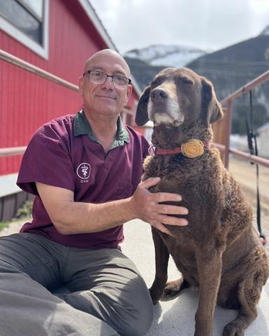 Photo credit DeAnne Gallegos Dr. Joe and Diesel Dog in front of the Silverton Senior Center during his monthly Silverton Veternarian pop up clinic
