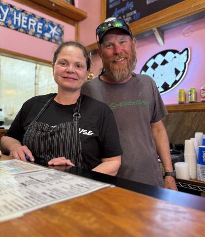 photo by DeAnne Gallegos Sherie and Chris Martin of T’s Smokehouse were happy to be open for the summer