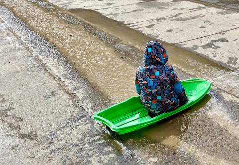 photo by Scott Fetchenhier When you can sled, you might as well kayak! Sledding in water instead of snow was all the rage for Christmas 2025