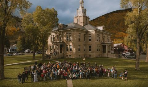 The San Juan County community group photo taken by local photographer Critt Kuenning from the town’s man lift