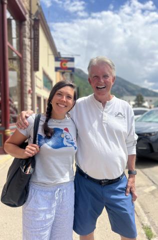 Photo credit DeAnne Gallegos Silverton Mayor, Dayna Kranker and Ken Boden, owner of Handlebars Restaurant, discuss bear-proof trashcans around town and share a laugh together.