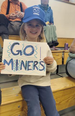Photo credit Dave Emory. #1 Miner's fan, Willow Blakenship, shows her support.