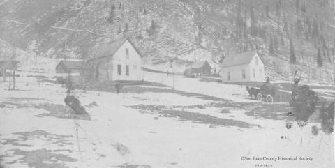 The settlement at Boulder Gulch northeast of Silverton in 1876. Years layer it was temporarily platted as Lemoyne City, just south of Boulder Creek. The frame house at right was the home of John and McIvina Reed, and the center was owned by John Day. Tim Parker Plantz cabin is behind it. San Juan County Historical Society