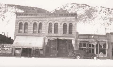 GREENE STREET, 1930 Silverton Standard &amp; the Miner file photo Business fronts on Greene Street in the 1930s, including Fritz Hoffman’s Furniture and Hardware store and the Post Office Store housing the U.S. Post Office, right. A stake bed pickup with chains on the rear wheels is parked in front of the Post Office Store.