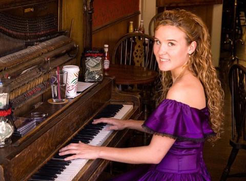 Lacey Black has played piano at the Saloon since 2000 and is now the owner. Photo by Lacey Rose Saloon