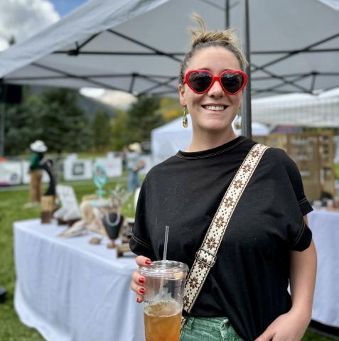 Melina Marks wears her sunglasses from the Perry Wedding last week. I think after that wedding, we will be seeing lots of heart-shaped glasses around town photo by DeAnne Gallegos