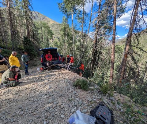 SMR repeling down the revine to access the patients involved in the OHV rollover photo by SMR