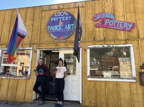 Silverton local art gallery owners Ian Tanner and Evin Harris in front of their colorful shop Photo credit DeAnne Gallegos