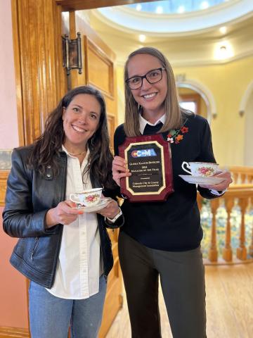 Mayor Dayna Kranker &amp; Gloria Kaasch-Buerger celebrated her manager of the year award at the surprise Heavy Metal Tea Party in town hall this past Spring. Photo by DeAnne Gallegos