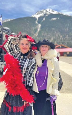 Photos by the Silverton Area Chamber of Commerce Carolyn Wilcox and Judy Graham greet the train in Victorian Garb