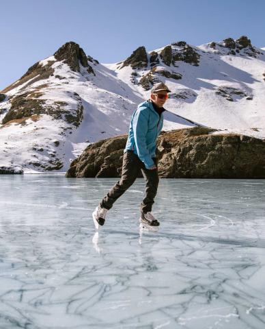 Photo By Critt Kuenning Ice season up high on top of the San Juans has started. Silverton local Joel Kuenning takes a skate on alpine ice.