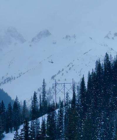 Helicopter heading into the Middle Fork of Mineral Creek to recover avalanche victim. Photo credit DeAnne Gallegos