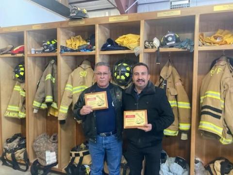 Fire Chief Gilbert Archuleta received a plaque from Joselo Perez, who is the secretary of the Madera fire municipality. Photo credit SSJVFD