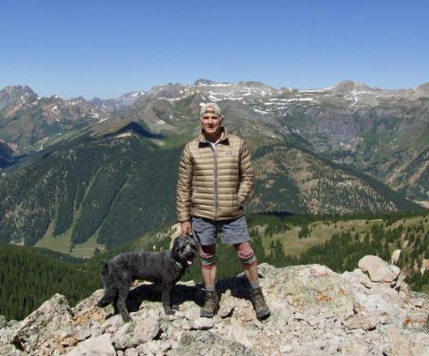 Jeff Burch on top of Ohio Peak just north of Silverton with his dog Photo by Jeff Burch