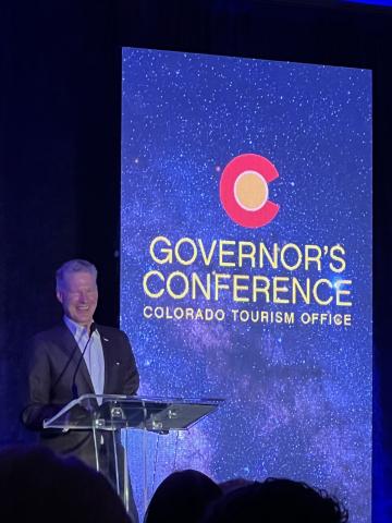 Colorado Tourism Office’s Executive Director Tim Wolfe addresses the crowd of 600 tourism professionals at the Governor’s Annual Tourism Conference. Photo credit DeAnne Gallegos