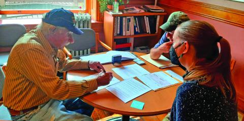 Dave Zanoni, George Zanoni and Town Administrator Gloria Kaasch-Buerger facilitating the closing on the land. Photo Credit Town of Silverton