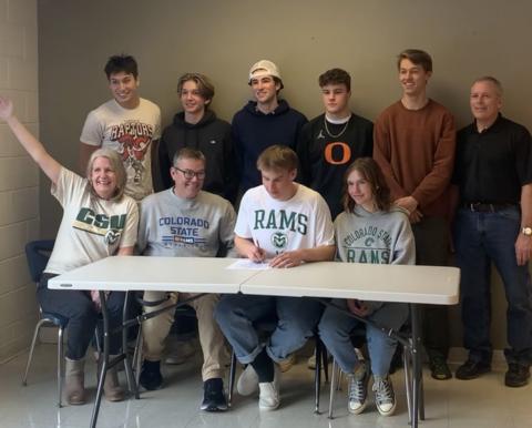 Paton signing with CSU with his track team, coach Roger Carlson, mom &amp; dad Jane &amp; Anthony Edwards &amp; sister Amelia. Photos provided by the Edwards Family