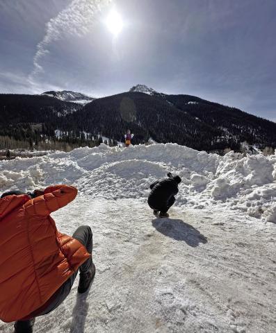 Photo credit Kahla Sorich Ava Andrade (who has a birthday today) posing on a snow hill in Silverton for Osprey photographers.