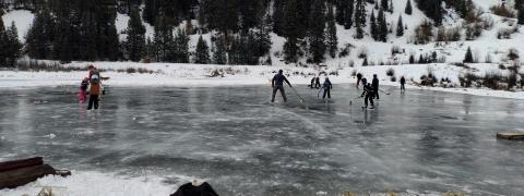 Lots of skating and hockey at the pond near Kendall Mountain. Photo Credit Dayna Kranker