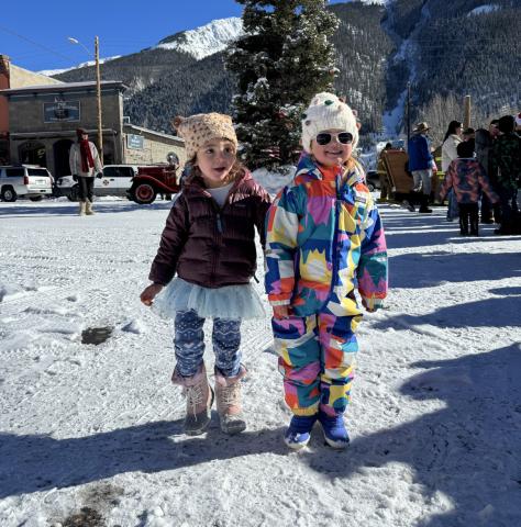 Ava Andrade (l) and Willow Blankenship (r) waiting in line to see Santa. Photo credit Katey Fetch