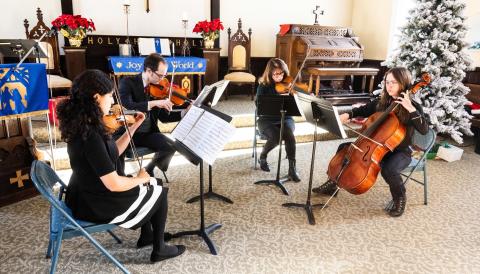 The Anvil Quartet performs at “Strings and Silver Bells” at the First Congregational Church on December 15th. Photo credit Dave Emory
