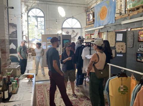 Folks enjoying the member art show August. Photo submitted by SPC