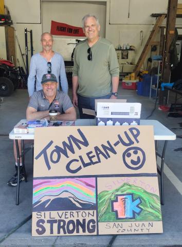 Silverton Medical Rescue’s Michael Burton poses with volunteers for the Town Clean up Day on Saturday. Photo credit Dayna Kranker