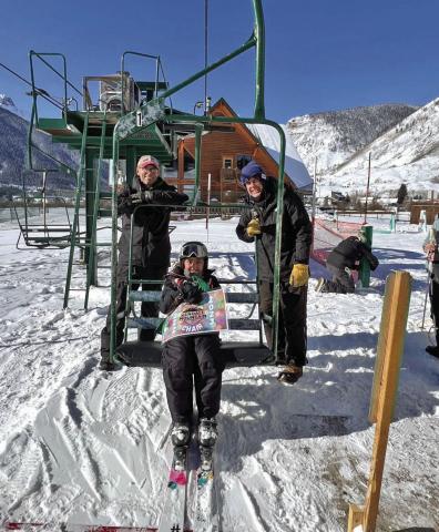 9 year old Jayden Jones gets first chair of winter season. Town of Silverton’s Chris Higgins &amp; David Swanson are Kendall Ski Area lift operators. Photo by DeAnne Gallegos