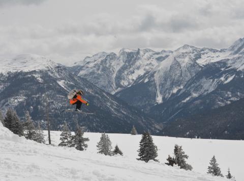 Silverton Local Griff Pinto flies off the jump at this first annual snow jump event. Photo credit Double A Gelande event