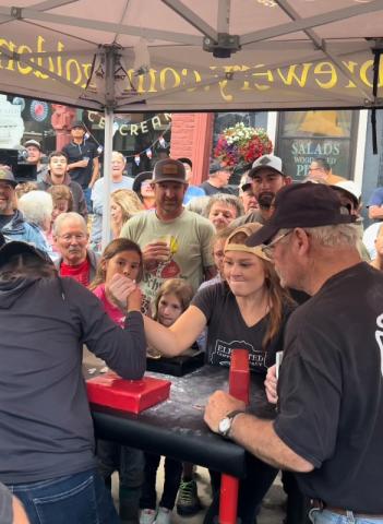 Silverton’s Kim xx beat Silverton’s Daley xx in arm wrestling. Photo credit DeAnne Gallegos