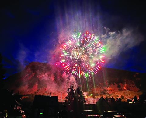 The fireworks burning bright above town Photo by Jamilynn Kaiser (Smith)
