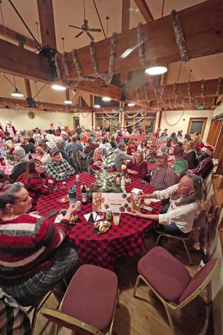 The annual holiday potluck was a packed event. Photo credit DeAnne Gallegos