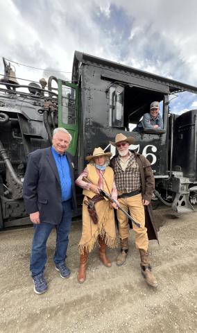 DSNGRR owner Al Harper poses with local Melodee Horton and San Juan County Sheriff Bruce Conrad for the first train in May of 2024. Photo credit DeAnne Gallegos