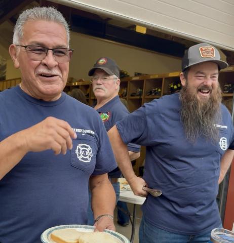 Fire Chief Gilbert Archuleta and Wayne were all smiles while grilling hot dogs and hamburgers during the 150th; Terry Rhoades is in the middle photo by DeAnne Gallegos