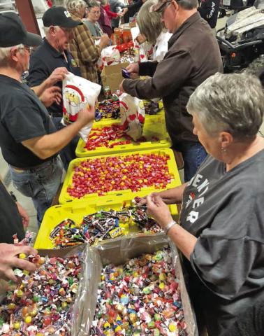 Getting Candy Ready For Christmas Eve Santa Visit. Photo by Silverton Fire Dept