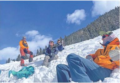 Resting after a successful practice rescue. From the right Cameron Crowell, Kelly Fetch, Erin Laine, and Kelly Weakley. Photo by Katey Fetch