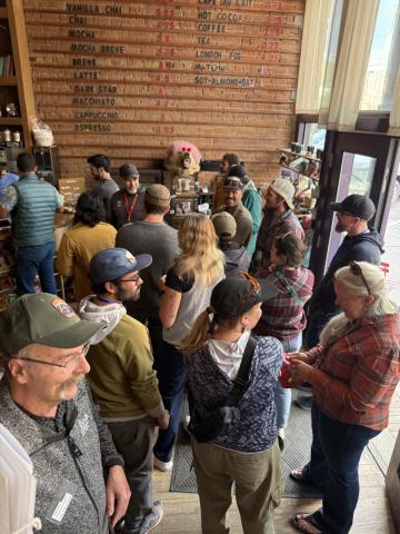 SJC Commissioner Scott Fetchenhier (front left) attended the MMS opening night networking event at Coffee Bear photo by DeAnne Gallegos