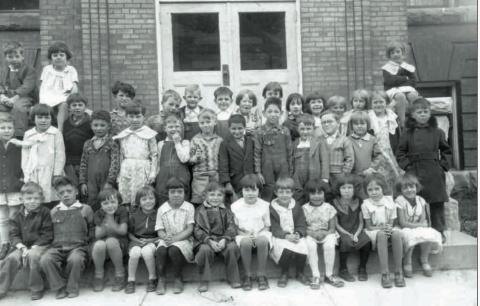 Young Silverton School students at the Snowden Street entrance to the school, probably in 1928. Photo courtesy of San Juan County Historical Society SILVERTON STUDENTS, 1928