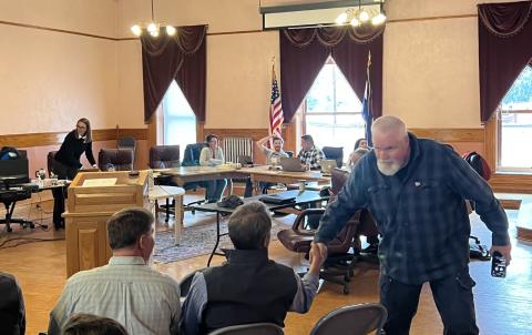 San Juan County Commissioner Pete Maisel greets San Miguel Power’s CEO Brad Zaporski. Photo credit DeAnne Gallegos