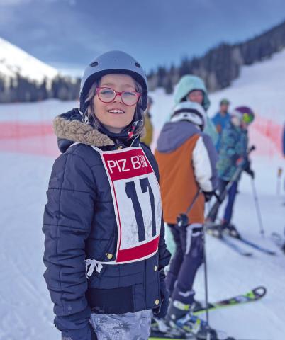 Ella Anderson smiling at the Kendall Community Races. Photo by Misti Anderson